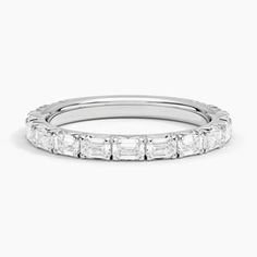 a white gold wedding band with princess cut diamonds