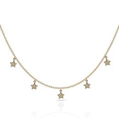 Diamond celestial charm star necklace in 14k gold statement Charming celestial charm necklace featuring five pave set diamond stars with a 16" and a 2" extension chain Ideal for layering statement Diamond Information: 40 diamonds .15 cts statement Gold: White, yellow and rose gold In Stock: one in 14k yellow gold Diamond Star Charm Necklace In Celestial Style, Celestial Diamond Necklace With Star Charm, Celestial Diamond Star Charm Necklace, Celestial Dangle Necklace With Star Charm, Celestial Diamond Jewelry With Star Charm, Fine Jewelry Yellow Gold Diamond Necklace With Star Charm, Yellow Gold Diamond Necklace With Star Charm, Celestial Diamond Star Of David Jewelry, Diamond Star