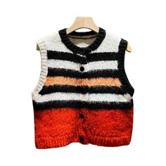 Made with a blend wool, this vest offers superior insulation and comfort. The classic striped design adds a touch of sophistication, making it a versatile addition to any wardrobe. - Color: Red- Style: Vest- Pattern Type: Stripes- Sleeve Length: Sleeveless- Fabric: Wool- Closure Type: Button- Collar Type: Round Neck- Fit Type: Regular Fit- Occasion: Casual- Gender: Women- Size: S, M SIZE CHART (cm) SIZE Shoulder Bust Length S 36 94 47 M 36 100 49 1inch = 2.54 cm, 1cm = 0.39 inch