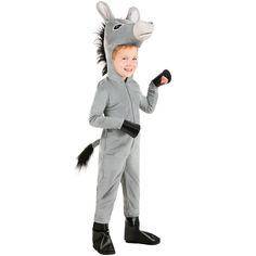 a little boy dressed in a donkey costume