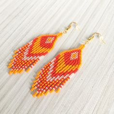 Orange Red Beaded Earrings, Halloween Seed Bead Earrings With Fringe, Bohemian Waterfall Earrings - Etsy Red Beaded Fringe Earrings For Summer, Summer Orange Beaded Tassel Earrings, Orange Beaded Fringe Jewelry For Festival, Red Bohemian Beaded Fringe Earrings, Bohemian Orange Fringe Earrings, Summer Orange Beaded Fringe Earrings, Orange Beaded Fringe Dangle Earrings, Orange Beaded Fringe Earrings As Gift, Orange Fringe Beaded Earrings As Gift