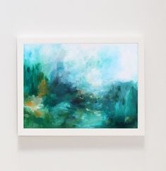 an abstract painting hangs on the wall