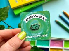 A mini enamel pin of a cute little green oak leaf. The pin is high quality hard enamel, with gold plating, and measures 2cm by 1.5cm. All my pins come presented on their own little matching backing cards, perfect for gifting or as a special treat to youself. The important stuff: ● Leaf measures 2cm by 1.5cm. ● Gold metal filled with tealy green hard enamel. ● Rubber Backs for extra security. ● Presented on a cute matching backing card. Pin Oak Tree, Cute Enamel Pins, Cafe Branding, Pin Cute, Vert Turquoise, Sticker Storage, Stationery Store, Backing Card, Oak Leaf