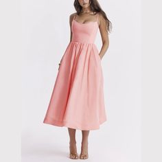 Step into elegance with our Spaghetti Strap A-Line fit and flare Midi Dress. This dress promises a graceful silhouette with its fitted bodice and flowing skirt. The spaghetti straps offer a delicate touch, perfect for both casual outings and special occasions. Made from lightweight, breathable fabric, it's designed for comfort without sacrificing style. Pair it with sandals for a relaxed look or heels to make a statement. Versatile and chic, this midi dress is a wardrobe must-have. Color: White, Brunch Dress With Spaghetti Straps And Fitted Bodice, Brunch Dress With Fitted Bodice And Spaghetti Straps, Fitted Bodice Dress With Spaghetti Straps For Brunch, Spaghetti Strap Dress With Fitted Bodice For Brunch, Summer A-line Suspender Dress With Fitted Bodice, A-line Midi Dress With Adjustable Straps And Fitted Bodice, Spring Fit And Flare Dresses With Adjustable Straps, Midi Length Dresses With Fitted Bodice, Spring Dresses With Fitted Bodice And Spaghetti Straps