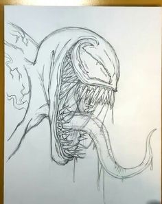 a drawing of an alien head with sharp teeth