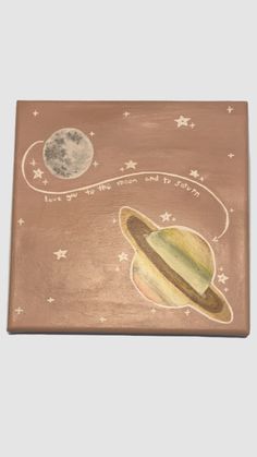 an image of a painting with saturn and the moon on it's side in copper