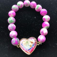 Nwot. Fashion Jewelry . Boho. Love Wrap Bracelet. Purple & Pink Synthetic Gems. Great Christmas Gift. Multicolor Heart Charm Bracelet, Adjustable Purple Jewelry With Heart Charm, Purple Bracelets For Valentine's Day, Heart-shaped Multicolor Bracelets For Mother's Day, Valentine's Day Multicolor Charm Bracelet With Heart Beads, Valentine's Day Multicolor Heart Beads Charm Bracelet, Purple Round Beads Jewelry For Valentine's Day, Purple Round Bead Jewelry For Valentine's Day, Multicolor Stretch Bracelet For Valentine's Day Gift