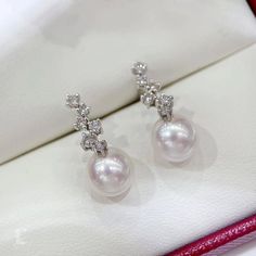 Highline: Elegant Style Product Information OriginJapan MaterialAkoya Pearl, 18k Gold, and Diamond DimensionsEarrings Length Approx. 2.0 cm Pearl Shaped: Round Size: 8-8.5 mm Quality: AAA Nacre: Very Thick Color: White Luster: Aurora Accessories Metal: 18k White Gold Other: 0.45 ct of SI Quality Natural Diamond Luxury Platinum Pearl Earrings For Formal Occasions, Luxury Platinum Pearl Earrings, Luxury Platinum Pearl Earrings For Wedding, Elegant Round Platinum Pearl Earrings, Luxury Diamond Pearl Earrings For Formal Occasions, Luxury Diamond Pearl Earrings For Formal Events, Exquisite White Platinum Earrings, Elegant Platinum Pearl Earrings For Formal Occasions, Elegant White Platinum Bridal Earrings