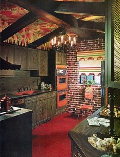 a kitchen with red carpeting and wooden cabinets in the center, along with brick walls