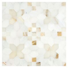 an abstract white and gold mosaic tile pattern