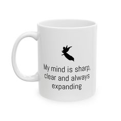 a white coffee mug with the words my mind is sharp, clear and always expanding