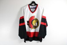 Ottawa Senators CCM Hockey Jersey: Underarm To Underarm (Inches): 22 Shoulder To Bottom (Inches): 28 Sleeve (Inches): 23 Tag Size: MEDIUM - FITS LIKE LARGE **All Measurements Are Taken With The Item Laying Flat On A Table - Please Refer To Measurements Before Placing An Order And Feel Free To Reach Out About Specific Measurements** FLAWS: Classic Vintage Wear/Blemishes - Please See Pictures For Any Wear/Tear - If There Are No Pictures Of Specific Flaws, The Item Is FLAWLESS Welcome To Vintage Sc Ccm Hockey, Inventory Tracking, Ottawa Canada, Jersey Vintage, Ottawa Senators, Team Uniforms, Meet The Team, One Stop Shop