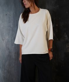 Cozy oversized white colour raw edge sweatshirt.  Gender neutral soft and comfy top. 95% cotton, 5% elasthane. One size Measurement: Chest: 46″ (118 cm) Length: 27″ (69 cm) Sleeve till neck: 22″ (56 cm) Bottom: 47″ (120 cm) Model's size M (Height - 180 cm / 5.9 feet) Great condition! White Cotton Top, Oversize Sweatshirt, White Kimono, Neutral Tops, Sweatshirt White, Loose Fitting Tops, Comfy Tops, Kimono Sleeve, Oversized Sweatshirt