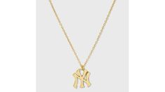 Elevate your game day style with the Bijoux Sport by Luv Aj MLB Logo Charm Necklace. Regardless of which team you’re rooting for, we’ve got the perfect pieces to help you show off your team spirit. This necklace features a sleek charm crafted from high-quality gold-plated brass, ensuring durability and a polished metal finish. The necklace is adorned with an eye-catching logo charm of your favorite MLB team. High quality but also affordable, these pieces are built to endure much more than a nine-inning game. Whether you’re looking for a subtle way to show your team spirit or a striking statement piece, our Bijoux Sport by Luv Aj collection is a guaranteed home run for all fans. | Luv Aj Bijoux Sport MLB Gold Plated Brass Logo Charm New York Yankees Gold Necklace | Target Mlb Logos, Luv Aj, Mlb Teams, Home Run, New York Yankees, Team Spirit, Game Day, Statement Pieces, Charm Necklace