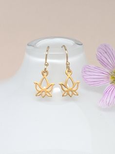 Our gift to you 10% off your first purchase. Details here - http:/eepurl.com/dpVPBz Dainty and tiny lotus flower earrings Definitely the perfect little earrings DETAILS 14 k gold fill ear wires or sterling silver ear wires The dainty lotus charm is made of the highest quality 24 k gold plate or sterling silver Total length from top of ear wire to bottom of lotus is 20 mm Lotus flower charm is 10 mm long These earrings are sold as a pair All earrings are non refundable, returnable or exchangeable Delicate Tiny Flower Earrings For Gift, Dainty Gold Flower Earrings As A Gift For Her, Gold Nickel-free Flower Earrings As Gift For Her, Dainty Gold Flower Earrings For Her, Gold Earrings With Flower Charm As Gift For Her, Dainty Gold Flower Earrings For Gifts, Gold Earrings With Flower Charm For Her, Small Gold Earrings For Gift, Delicate Tiny Gold Flower Earrings