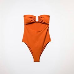 Zara Cut Out One Piece Swimsuit In Shade Burnt Orange. Stunning! New With Tags. Size Small. Ref 0167/012 Chic Orange Swimwear For Swimming, Chic Orange Swimwear, Chic Zara Swimwear For Vacation, Zara Summer Beach Bodysuit, Zara Summer Bodysuit For Beach, Chic Zara Swimwear, Zara Solid Color Beachwear Swimwear, Zara Summer Party Bodysuit, Chic Zara Bodysuit For Beach