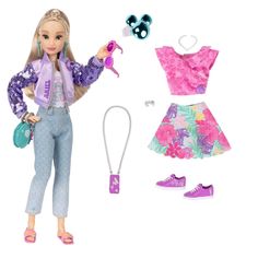 a barbie doll with clothes and accessories for her