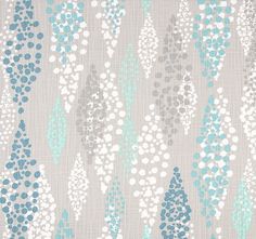 an abstract pattern with blue and white dots on grey fabric, which is very similar to the same color scheme