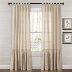 the curtains in this room are lined with ruffles