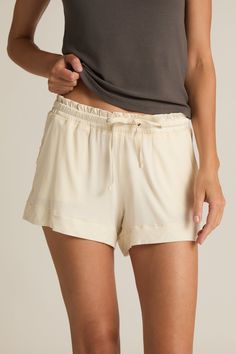 A cozy fit satin waistband with a matching drawstring and side pockets will make our Faceplant Bamboo pajama shorts your go-to favorite for lounging around the house. The sophistication of satin on top of our gloriously soft fabric makes them elegant enough to walk around the house, while they’re short enough to feel sexy. A classic pajama bottom with a shorter inseam. True to size short with a 2.25” (small) to 3.25” (XL) inseam. A cozy fit satin waistband with non-binding elastic, matching draw Pajama Short, Matching Robes, Classic Pajamas, Women's Loungewear, Bamboo Pajamas, Lounge Dress, Sleep Shorts, Fine Yarn, Comfy Shorts