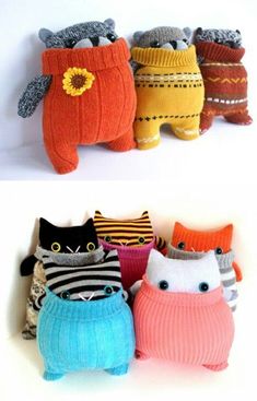 several knitted animals are sitting in sweaters