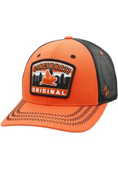 This Cincinnati Orange Adjustable Hat features a front embroidered team logo. Zephyr Rabble Rouser Meshback Hat, Front patch logo, Matching crown and visor, Contrast Meshback, Side Z logo, Cotton/Poly Blend, Wipe clean with cloth or cleaning kit, 4 Trucker Hat With Logo Patch For Sports Events, Adjustable Team Logo Cap, Collegiate Hats With Logo Patch For Game Day, Adjustable Hats With Team Logo For Baseball Season, Team-colored Baseball Cap With Logo Patch For Fans, Adjustable Baseball Hat With Team Logo, Baseball Cap With Letter Patch For Fan Gear, Game Day Snapback Hat With Team Logo, Adjustable Hats With Logo Patch For Fan Merchandise