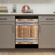 an empty dishwasher in the middle of a kitchen