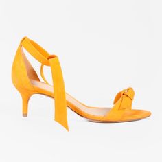 The Clarita Sandals From Alexandre Birman Are Crafted From Suede In Vibrant Orange And Feature The Signature Bow Embellishment On The Vamp, An Almond Toe, An Ankle Strap That Wraps Around The Ankle, And A Kitten Heel. Size: 37 Condition: Great; Faint Residue On Insoles, Minor Wear On Outsoles, No Inclusions Approximate Measurements: Insole Length: 9.5” (24 Cm) Heel Height: 2” (5 Cm) Composition: Suede, Leather Alexandre Birman, Suede Sandals, The Vamps, Vibrant Orange, Kitten Heel, Women's Shoes Sandals, Suede Leather, Ankle Strap, Kitten Heels