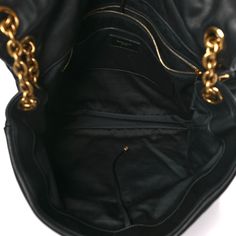 This is an authentic SAINT LAURENT Lambskin Maxi Large Jamie 4.3 in Black. This stunning shoulder bag is crafted of lambskin in black. The bag features an aged gold chain link cross body shoulder strap with shoulder pads and a facing flap with an aged gold YSL logo. The flap opens to a black fabric interior with zipper and patch pockets Ysl Logo, Black Fabric, Shoulder Pads, Chain Link, Gold Chain, Patch Pocket, Gold Chains, Cross Body, Saint Laurent