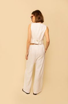 The only pants you’ll ever need. The Kira Pant has a relaxed fit with an adjustable tie waist. Make it a set and pair with the matching Valentina Top or the Bowie Vest. High-waisted Pants With Tie Waist And Relaxed Fit, Linen Tie Waist Pants For Work, High-waisted Relaxed Fit Pants With Tie Waist, Relaxed Fit High-waisted Pants With Tie Waist, Workwear Linen Pants With Tie Waist, Loungewear Straight Pants With Tie Waist, Straight Loungewear Pants With Tie Waist, Straight Pants With Tie Waist For Loungewear, Elegant Loungewear Pants With Tie Waist