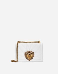 Adjustable chain strap Front flap with bejeweled branded heart hand-tooled from a metal alloy with pearl inlay Concealed press-stud fastening Nappa leather lining with a pocket with a zipper featuring a Devotion slider Item comes with a branded dust bag Measurements. 14.5 x 21 x 3 cm Made in Italy Dolce And Gabbana Devotion, Life Necessities, Woman Shoulder, Floral Pumps, White Shoulder Bags, Pearl Inlay, Quilted Crossbody Bag, Metal Heart, Leather Chain