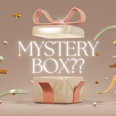 a box with a bow on top and streamers around it that says mystery box?