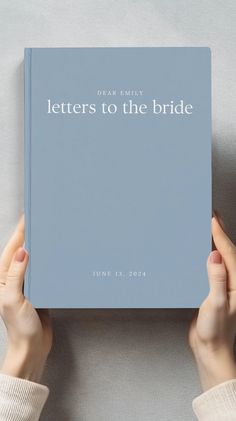 two hands holding up a book that says letters to the bride