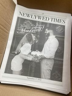 the newspaper is open to read about newlywed times