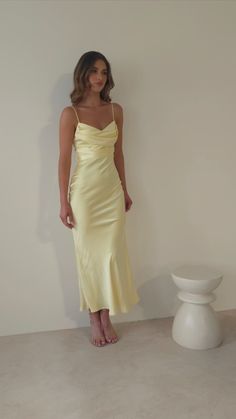 Everleigh Soft Satin Midi Dress | Butter Yellow Year Six Formal Dresses, Butter Yellow Satin Dress, Homecoming Dresses Midi, Long Silk Yellow Dress, Soft Satin Dress, Yellow Dress Satin, Pastel Yellow Dress Short, Yellow Satin Dresses, Light Yellow Satin Dress