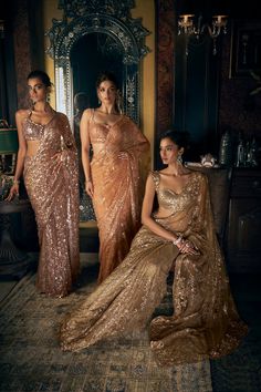 This copper tulle saree features all over tonal sequin and crystal embroidery in a floral pattern. The fully embroidered strappy blouse shows tassels at the waist.From Seema Gujral's Kashish collection DELIVERY TIMEPlease allow 8-12 weeks for your outfit to arrive. FABRIC DETAILSNet Professional cleaning only. Gold Sequin Saree, Strappy Blouse, Copper Dress, Desi Dress, Bridal Sari, Indian Bridal Sarees, Indian Sari Dress, Sequin Saree, Crystal Embroidery