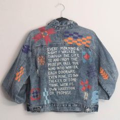 a denim jacket with words written on it