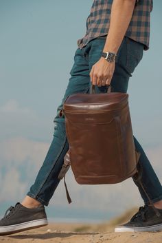 Embrace the dynamic lifestyle of the modern man with the Crazy Brown Maverick Backpack. Crafted with Solid Antique Brass hardware, this backpack is a stylish fusion of trendsetting appeal and practical  design. Whether you're navigating the urban jungle or embarking on a weekend adventure, the Maverick backpack provides ample storage and ergonomic features for ultimate comfort. The hand-polished zippers add a sophisticated touch, ensuring durability that withstands the demands of your on-the-go Modern Brown Bags For Outdoor, Modern Brown Outdoor Bag, Leather Backed Backpack For Everyday Use, Modern Brown Leather Backpack With Luggage Sleeve, Modern Brown Laptop Backpack, Modern Brown Rectangular Backpack, Modern Brown Leather Backpack For Outdoor, Modern Brown Backpack For Outdoor, Modern Brown Outdoor Backpack