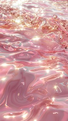 the water is pink and has some bubbles on it