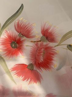 red flowers on white fabric with green stems