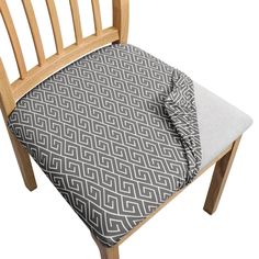 a wooden chair with a cushion on it