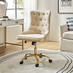 a white desk chair sitting on top of a rug