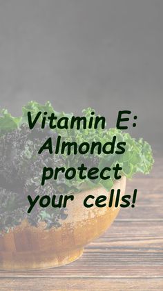 a wooden bowl filled with green leafy vegetables and the words vitamin e almonds protect your cells