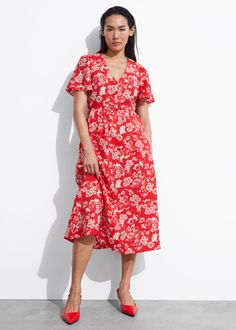 V-cut midi dress with a buttoned bodice, a defined waistline and flutter sleeves.• Duo slash pockets• Four button closuresLength of dress: 118.3cm / 46.5" (EU 36 / UK 10 / US 4) Linen Sweater, Knit Outerwear, Beachwear Skirt, Red Midi Dress, Midi Dress With Sleeves, Fancy Dress Costumes, Costume Dress, Maternity Wear, Swimwear Fashion