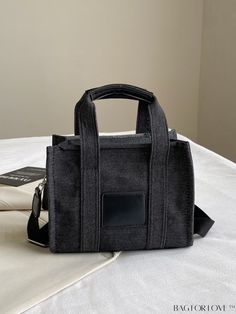 BagForLove - Stylish Denim Tote Bag with Spacious Capacity for Everyday Commutes Product Description Color Black Bag Size Medium Pattern Type Letter Closure Type Zipper Type Messenger Bag Composition 100% Polyamide Material Polyamide Size Chart INCH CM Strap Length Bag Length Bag Width Bag Height Handle Height 47.2 inch 13 inch 9.8 inch 5.5 inch 3.9 inch Strap Length Bag Length Bag Width Bag Height Handle Height 120 cm 33 cm 25 cm 14 cm 10 cm Details Pictures Similar Products h2 { text-align: center; } /* æ¢è¡ */ li{ white-space: normal; word-break: break-all; word-wrap: break-word; } .red-box { width: 100%; display: flex; flex-direction: row; flex-wrap: wrap; justify-content: center; } .red-box > div { width: 190px; height: 250px; margin: 10px; } .red-box > div > a > img { width: 190px; Black Rectangular Canvas Bag With Zipper Closure, Trendy Black Canvas Satchel Bag, Trendy Black Canvas Satchel, Trendy Black Canvas Bag With Zipper Closure, Casual Black Canvas Bag For On-the-go, Black Denim Travel Shoulder Bag, Chic Black Canvas Bag For On-the-go, Trendy Black Canvas Bag With Removable Pouch, Black Canvas Bag With Zipper For On-the-go