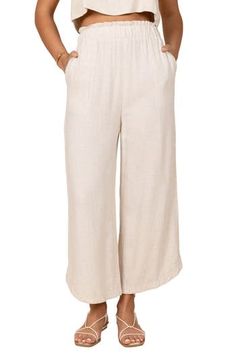 Easy and polished, these elastic-waist pants are crafted from lightweight linen with flowy wide legs. Elastic waist Side pockets Unlined 100% linen Hand wash, dry flat Imported Flax Wide-leg Pants With Pockets, Beach Linen Harem Pants With Pockets, Beach Harem Pants With Pockets In Linen, Spring Linen Culottes With Pockets, Relaxed Beige Linen Bottoms, Solid Linen Pants For Vacation, Chic Solid Linen Wide Leg Pants, Chic Solid Color Linen Wide Leg Pants, Spring Beige Flax Bottoms