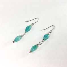 Nwot Beaded Dangle Earrings | Teal And Silver Colored Beads | Length Is 1.5" | Matching Necklace In Separate Post! Hypoallergenic Turquoise Beaded Earrings In Sterling Silver, Turquoise Sterling Silver Hypoallergenic Beaded Earrings, Adjustable Turquoise Earrings With Faceted Beads, Turquoise Dangle Earrings With Amazonite, Nickel-free Blue Dangle Jewelry, Blue Sterling Silver Earrings With Faceted Beads, Sterling Silver Blue Earrings With Faceted Beads, Blue Amazonite Jewelry With Faceted Beads, Turquoise Amazonite Dangle Earrings