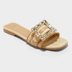 Adorn your feet with the glamorous style of the Kelsey Rhinestone Buckle Slide Sandals from A New Day™. These open-toe sandals feature a rhinestone buckle for a stunning look. The non-marking, textured outsole with a block heel approximately 1 inch high completes the chic aesthetic. Designed with a square toe, these slip-on sandals are great for all occasions. A New Day™: Style that goes wherever you do. Spring Open Toe Slides With Gold Buckle, Brown Beach Slides With Buckle Closure, Vacation Buckle Closure Slip-on Slides, Gold T-strap Sandals With Buckle Closure, Gold Buckle Closure Slip-on Sandals, Rhinestone Flats, Bow Flats, Footbed Sandals, Rubber Shoes