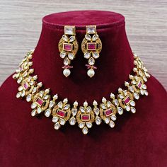 Exotic and snag-free kundan beaded necklace set with earrings. This is a stylish set with White Kundan. This set will work well with traditional, formal, and western formals. Eye-catching and unique jewelry that will set you apart. Gift this piece to a loved one, and see their face light up with joy. Best for gifting or for personal use, wear it to any occasion and become the spotlight. Option 1: White Color (D347) Option 2: Red Color (D348) Festive Dual-tone Kundan Jewelry Sets, Formal Chandbali Kundan Necklace For Festivals, Festive Dual-tone Kundan Bridal Necklace, Festive Kundan Temple Necklace For Formal Occasions, Kundan Sets For Formal Occasions In Temple Jewelry Style, Formal Kundan Temple Necklace For Festive Occasions, Elegant Dual-tone Kundan Necklace, Formal Kundan Temple Necklace For Diwali, Temple Style Formal Kundan Necklace