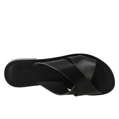 Roman style women's slipper sandal with double crossed band



 Smooth vegetable tanned black leather



 Leather sole



 Made in Italy




 Composition:
 Upper: 100% Leather
 Lining: 100% Leather
 Bottom: 100% Leather
 Insole: 100% Leather Black Leather Toe Ring Sandals With Leather Footbed, Black Open Toe Footbed Sandals With Leather Sole, Black Leather Toe Loop Ring Sandals, Leather Cross Strap Sandals With Leather Sole, Black Leather Toe Loop Sandals, Black Slippers With Leather Footbed, Single Toe Strap, Black Open Toe Slingback Sandals With Leather Lining, Black Leather Toe Ring Sandals With Open Heel, Black Leather Footbed Slip-on Slingback Sandals